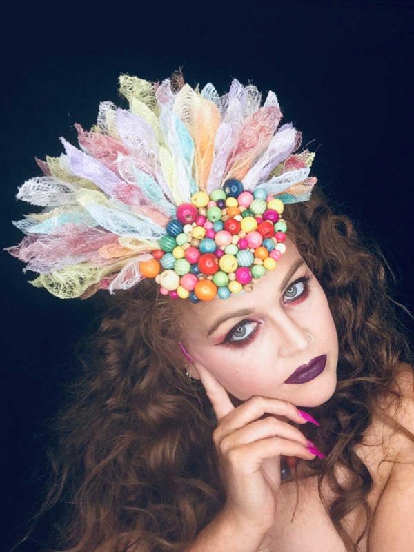 Circus is a bespoke millinery piece from Saraden Designs. It is a handmade piece including handmade fabric made in house by owner Sarah O' Rourke. Sarah is an Irish Milliner who is proud of her slow fashion brand.
